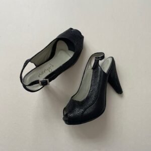 Sandalias altas negras en cuero con plataforma