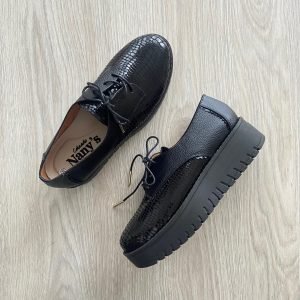 Bolicheros negros en cuero