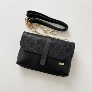 Bolso manos libres negro en cuero con opción de canguro